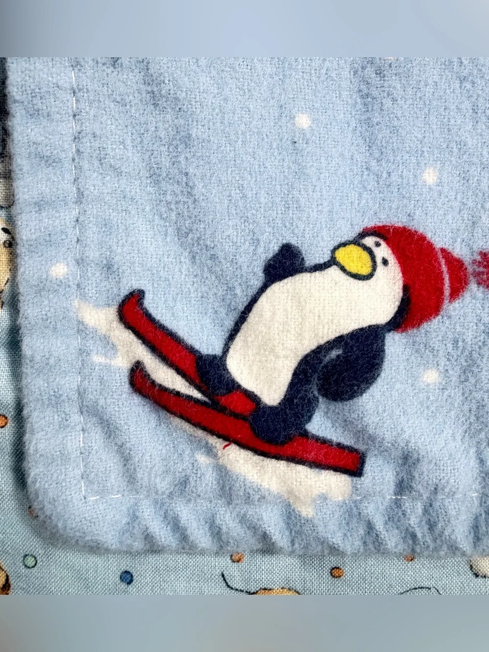 Light Blue Reversible Penguin & Animal Print Quilt Throw